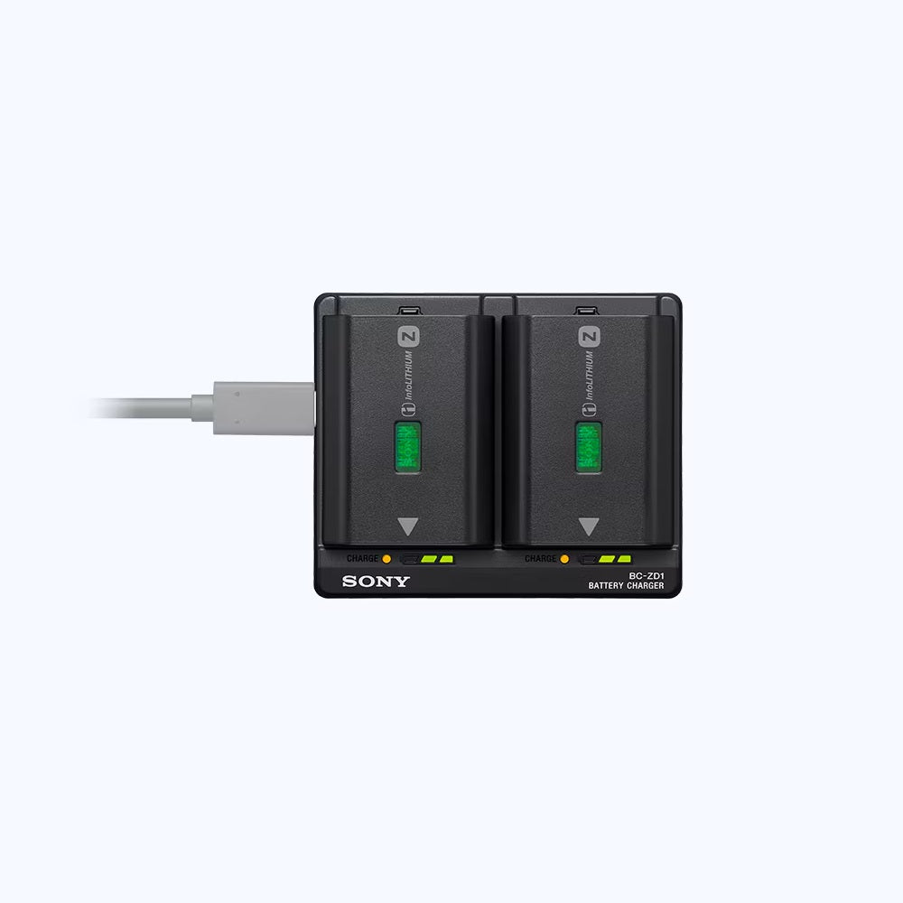 Sony battery charger with two battery slots on a white background