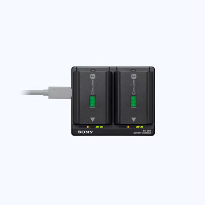 Sony battery charger with two battery slots on a white background